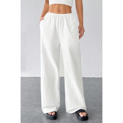 Kadın Beyaz Bol Kesim Cepli Geniş Paça Dökümlü Pantolon Kadın Beyaz Bol Kesim Cepli Geniş Paça Dökümlü Pantolon